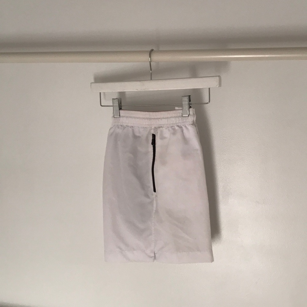 White “Safe” swim trunks