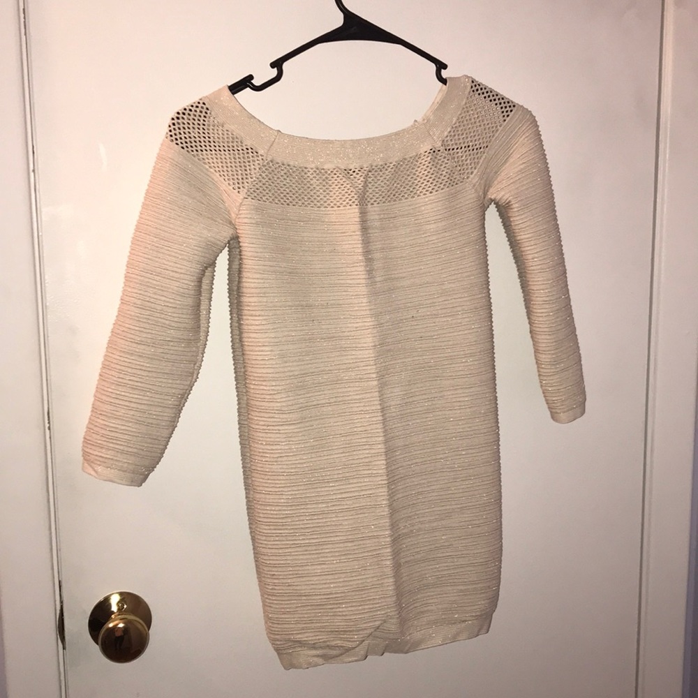 Really good condition bebe cream color shirt