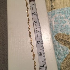 Gold dolphin bracelet
