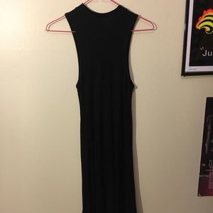 Black Cotton Dress With A Tight Neckline