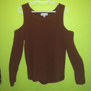 Shoulderless knitted rust sweater