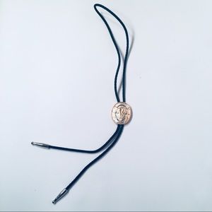 SILVER AND GOLD BUFFALO BOLO TIE