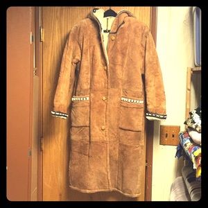 Shearling knee length leather coat