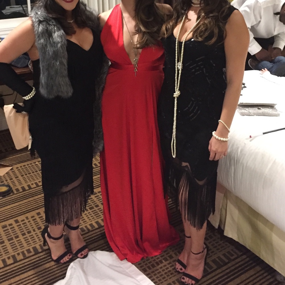 Nadine Merabi red gown