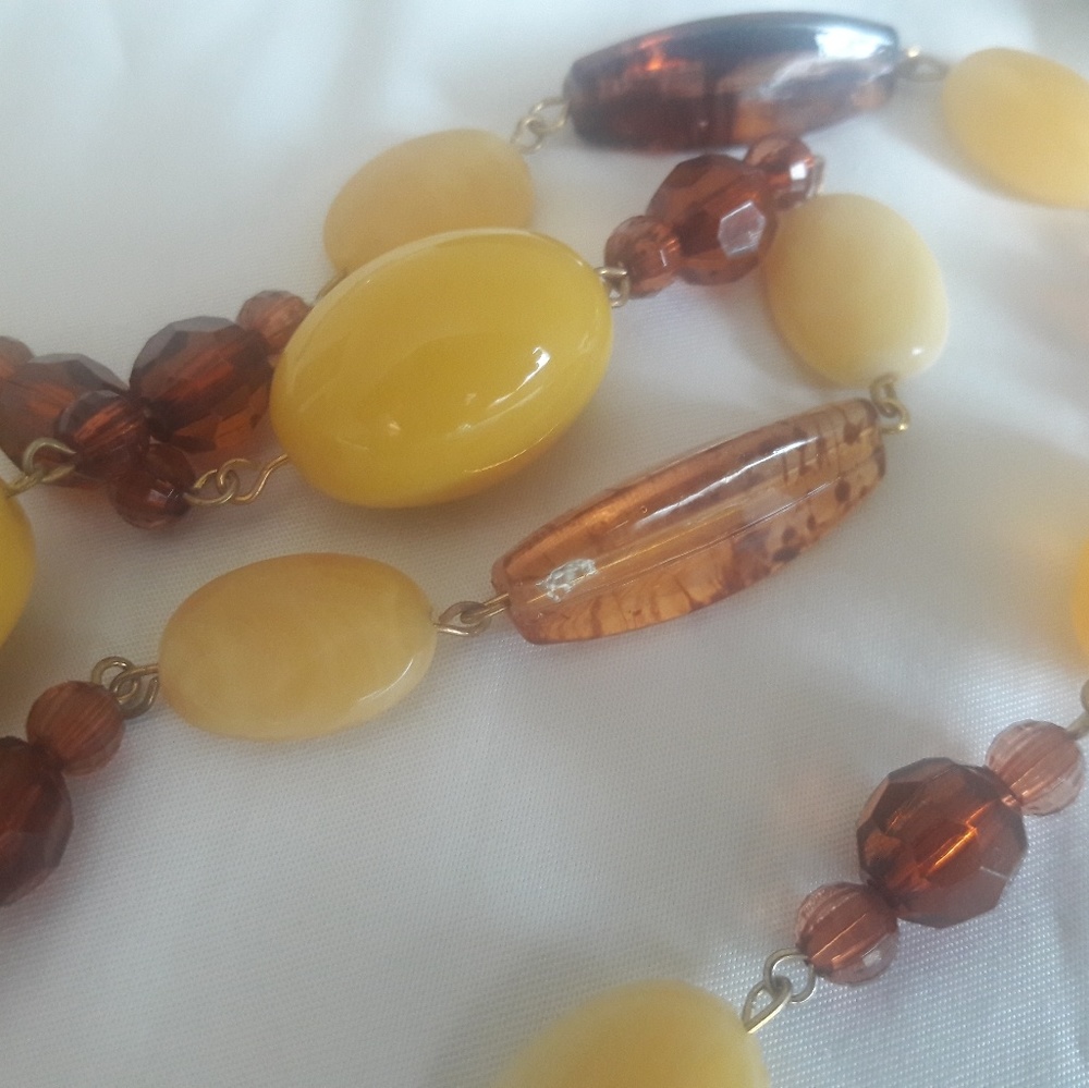 Long yellow and coffee brown beaded necklace