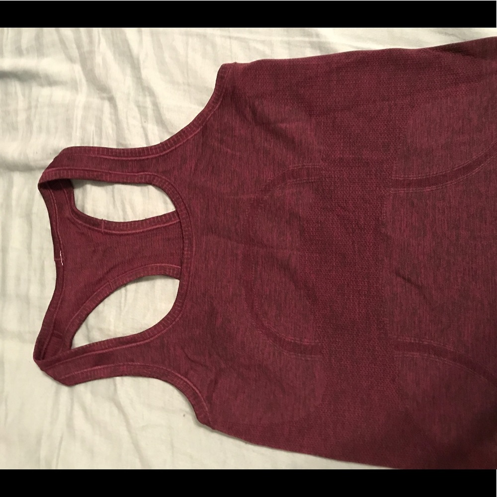 Lululemon tank never worn size 4!!