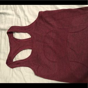 Lululemon tank never worn size 4!!
