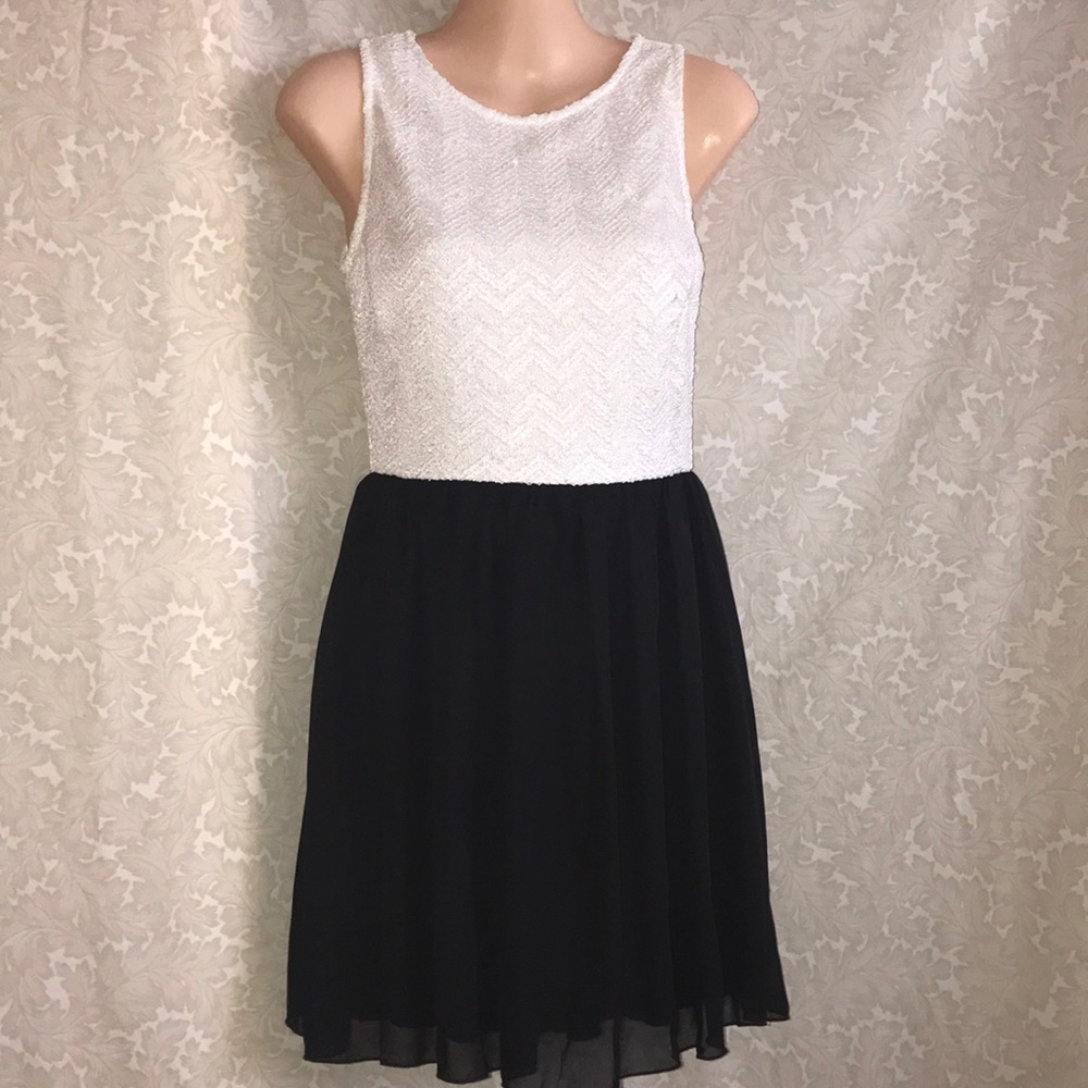 Juniors size small black and cream holiday dress.