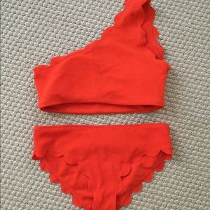 Orange scalloped bathing suit