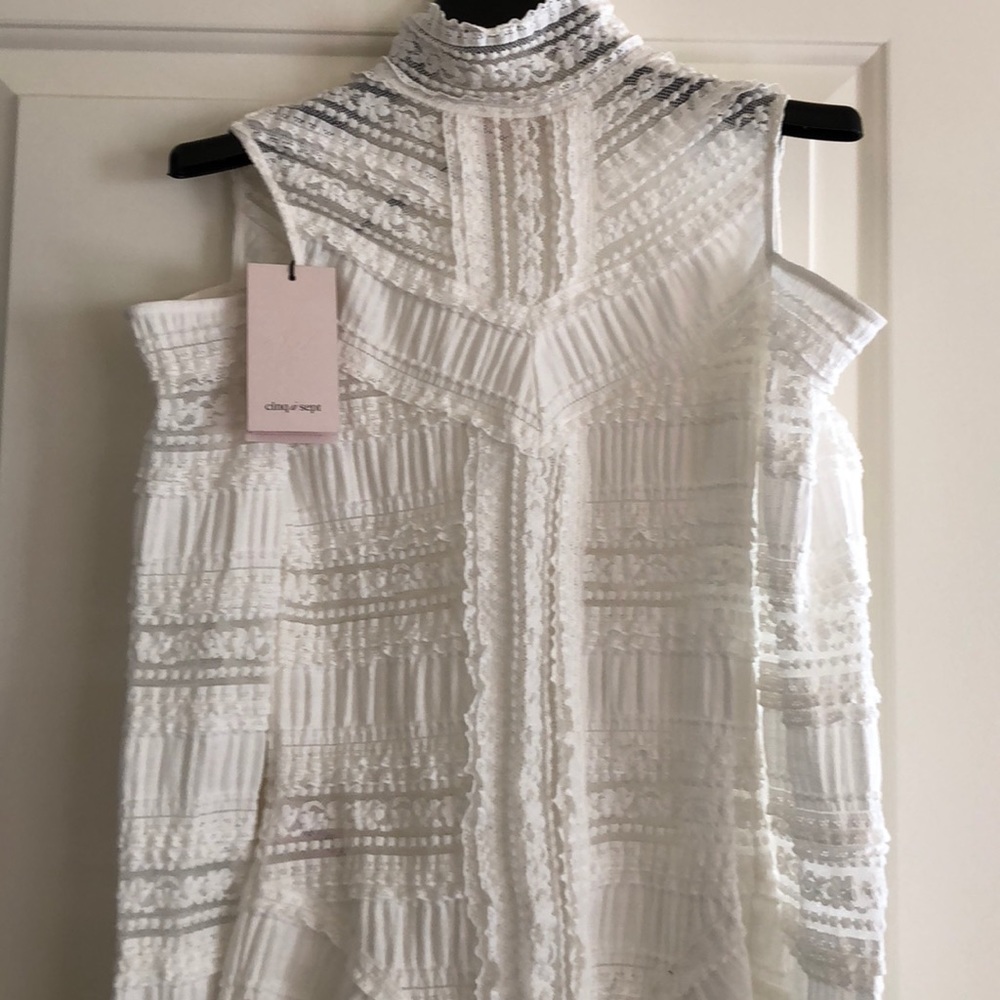 Lace white cut out on the shoulders top. Brand new