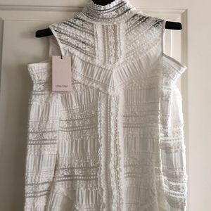 Lace white cut out on the shoulders top. Brand new