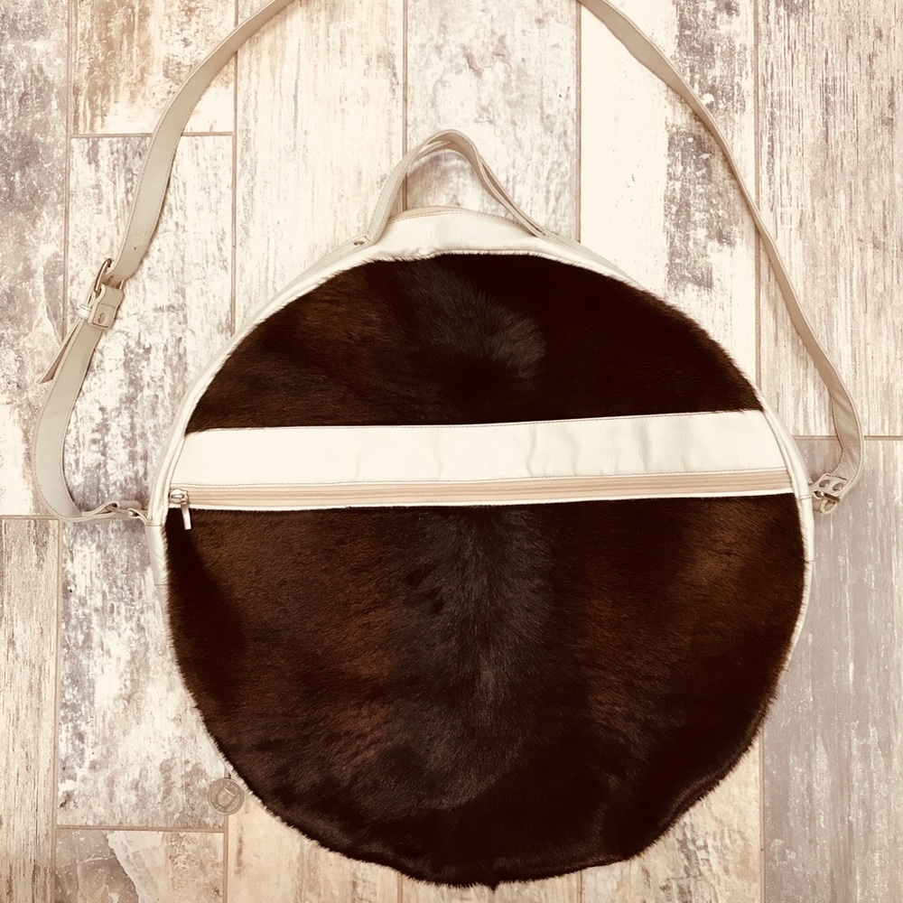 Cow hide round oversized bag