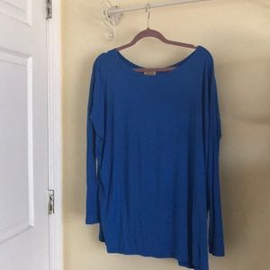 Size Medium, royal blue long sleeve Piko top!