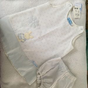 Well made dress and diaper cover.