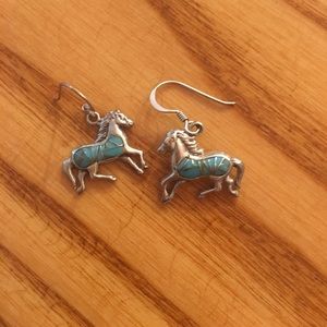 Never worn sterling silver horse earrings