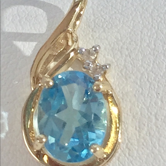 Fine Jewelry Jewelry - 14 kt blue topaz pendant with 2 real diamonds