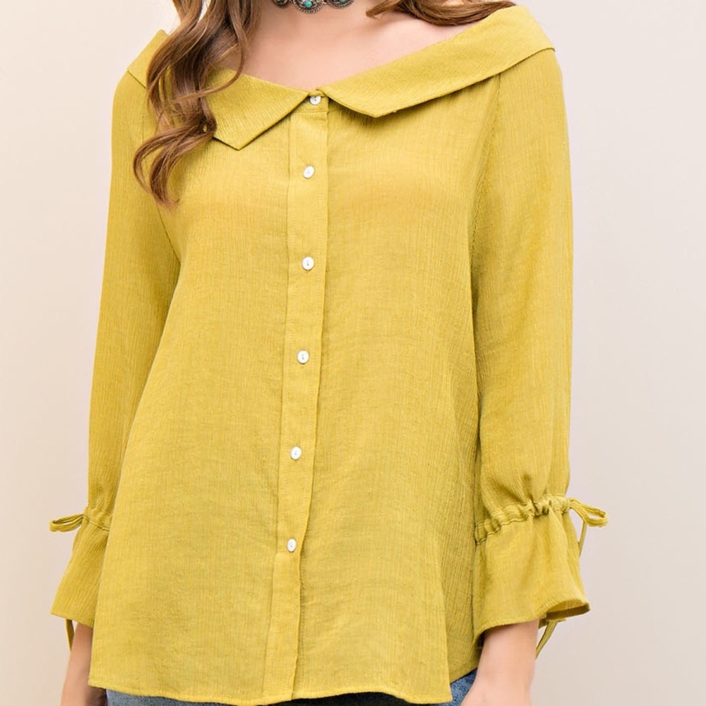 Crinkled Moss Colored button down shirt.