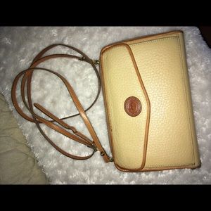 Vintage Dooney and Bourke zip along wallet