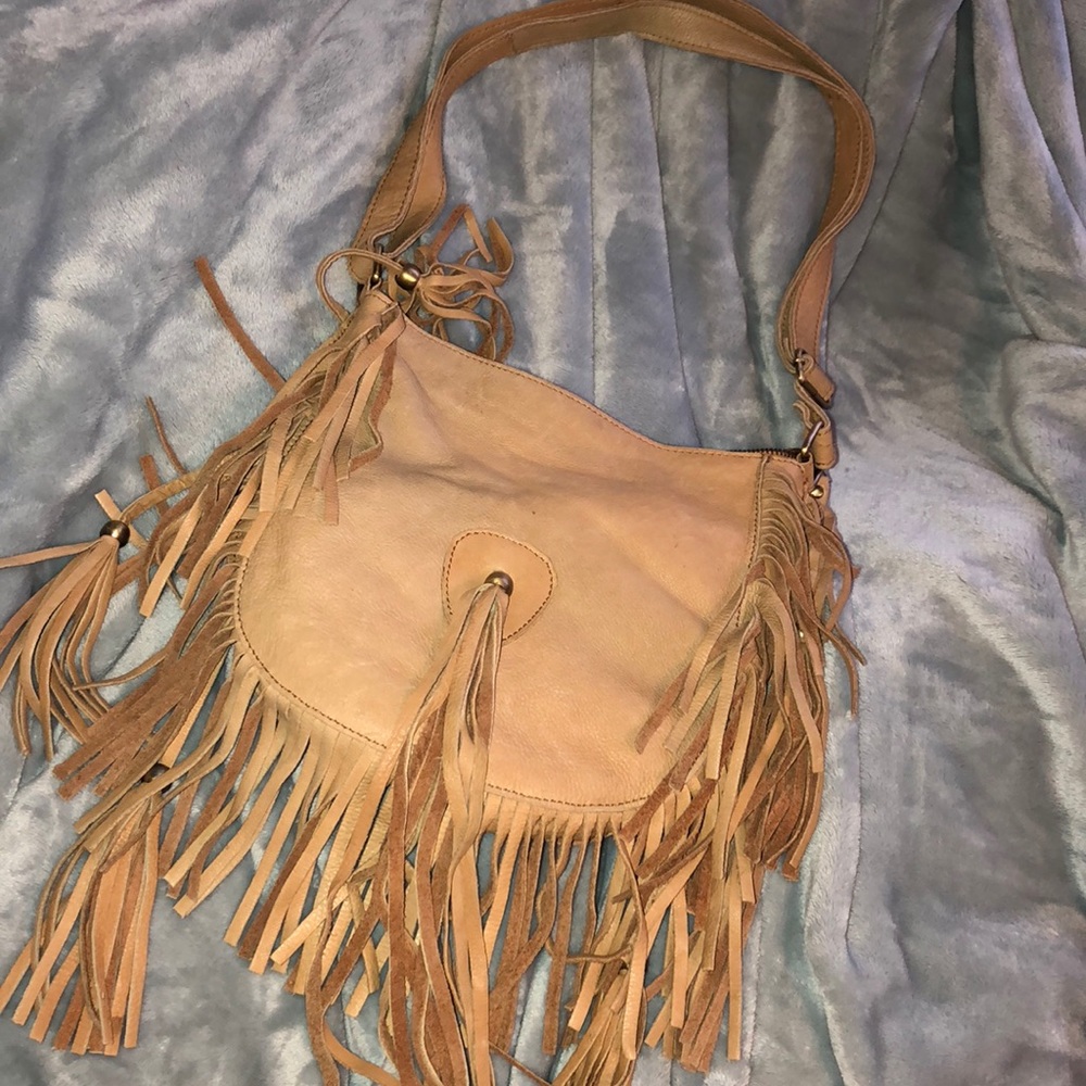 Cut and paste fringe leather bag
