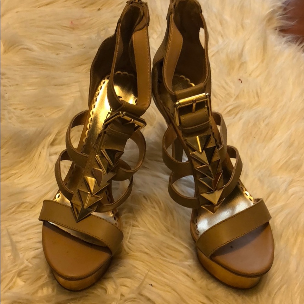 Bebe, tan and gold super high heels.