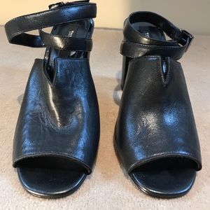 White House Black Market black leather mules