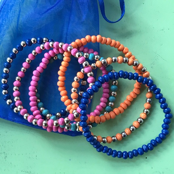 Set of 7 Wooden Multi Colored Bracelets. - Picture 3 of 3