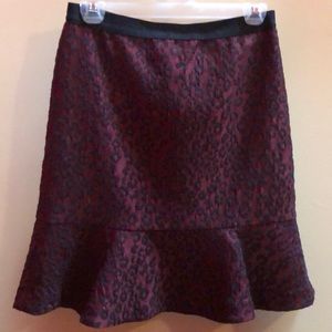 Skirt. Black and burgundy leopard print.