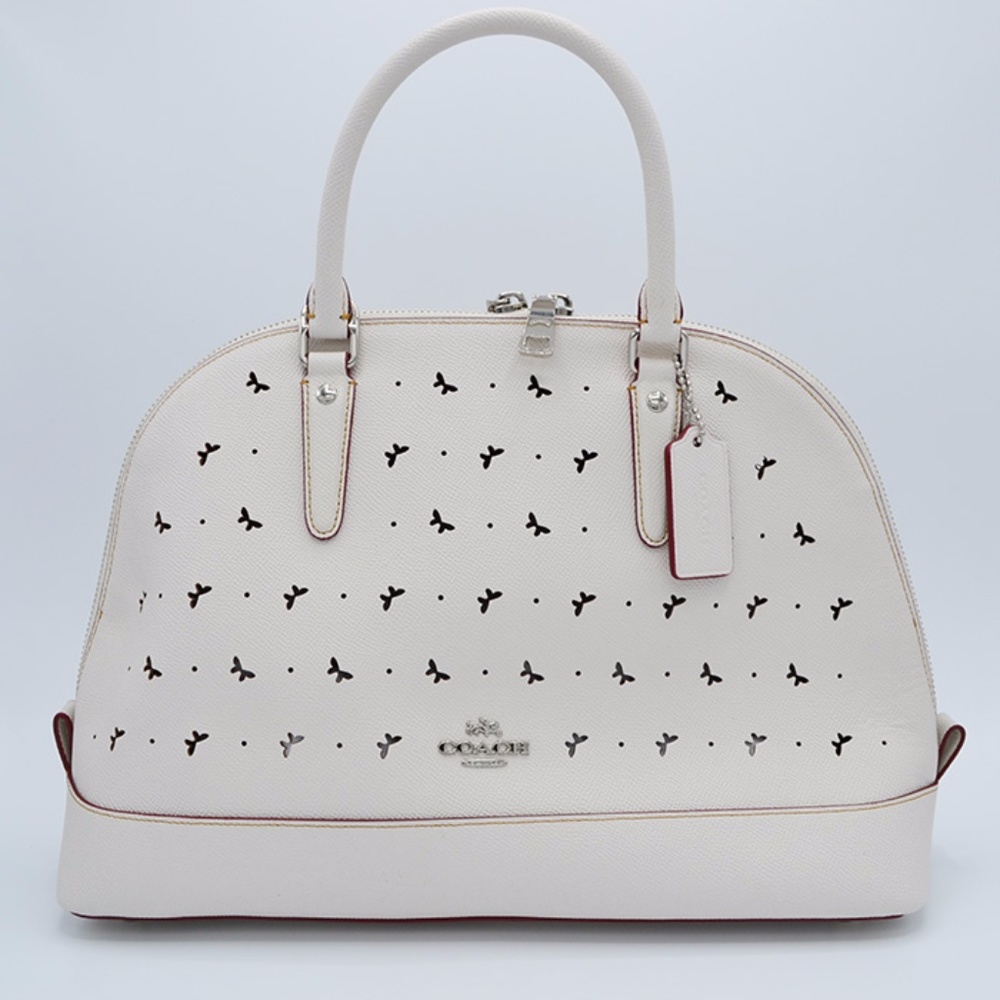 coach leather sierra in perforated crossgrain NWT!