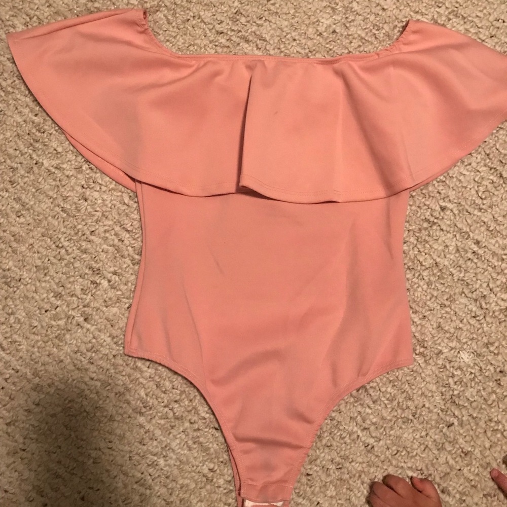 Off shoulder pink body suit