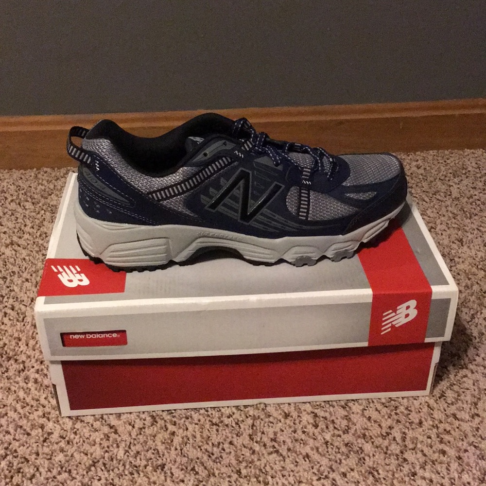 New Balance tennis shoes.