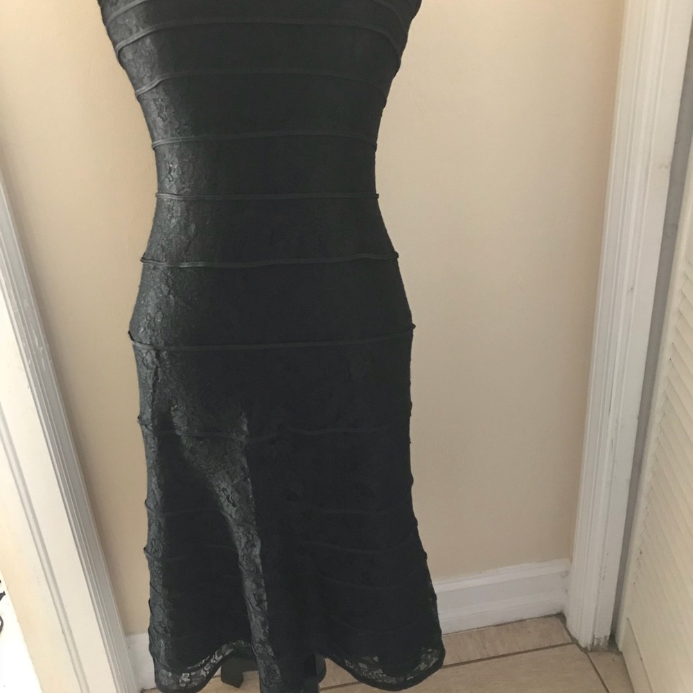 Lined Lace black strapless Cocktail dress by Tadashi in size 12.