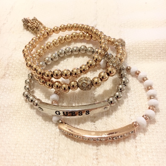 Guess Jewelry - Guess 4 Piece White and Gold Bracelet Set