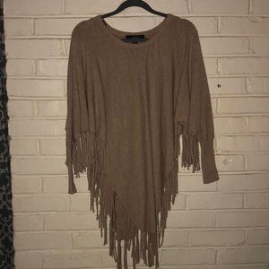 Tan poncho with fringe