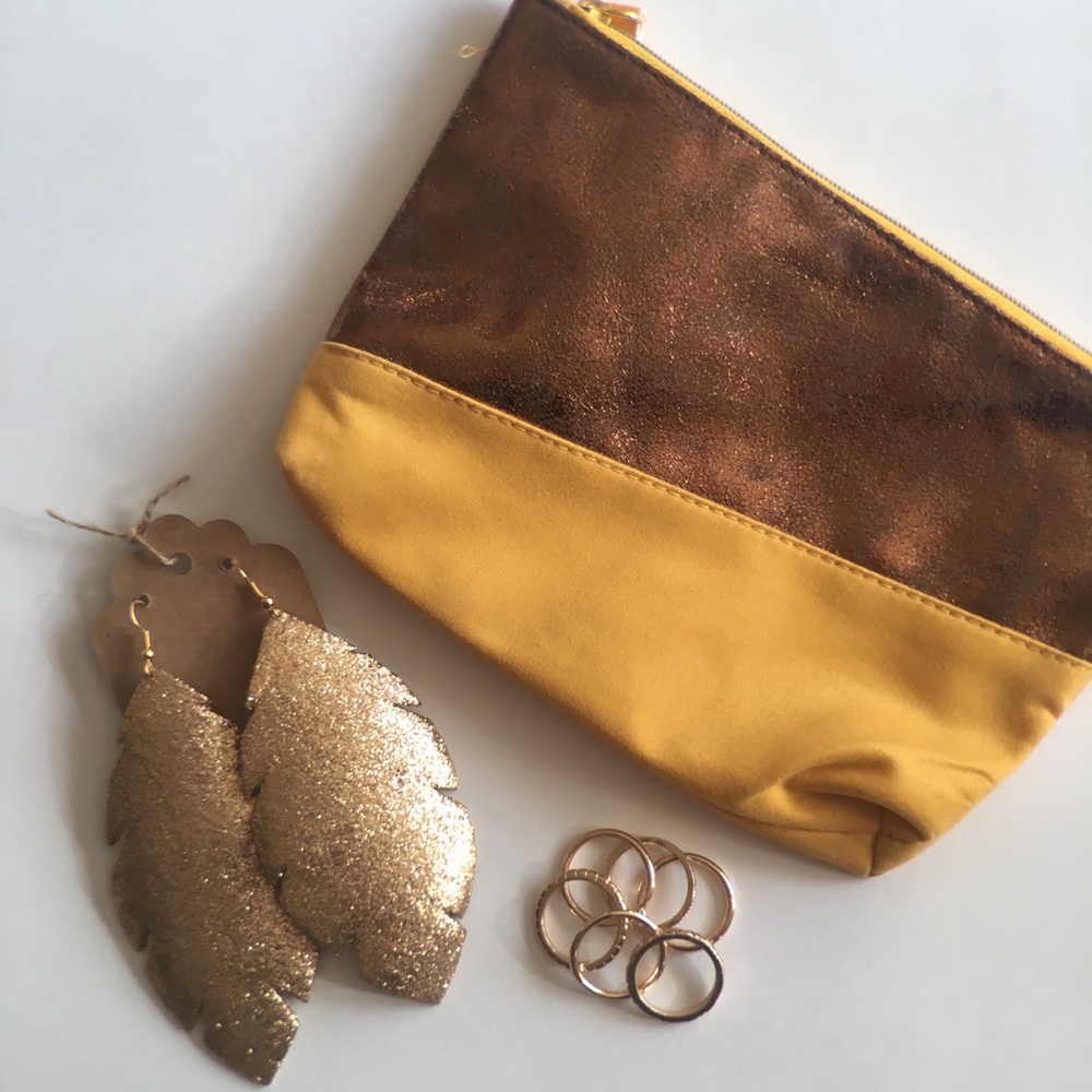 Leather feather earrings - open to trade