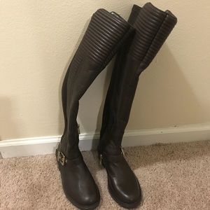 Brown over the knee boots...