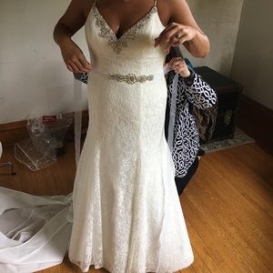 Size 14 and can go bigger due to corset dress