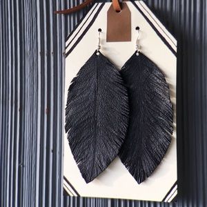 Leather feather earrings - open to trades