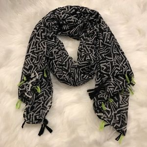 Black and white scarf with lime green tassels