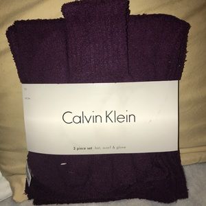 Calvin Klein maroon hat, scarf, and gloves