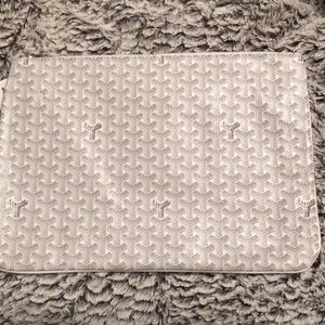 White Goyard clutch