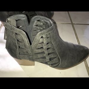 Light grey cut out booties with zipper back.