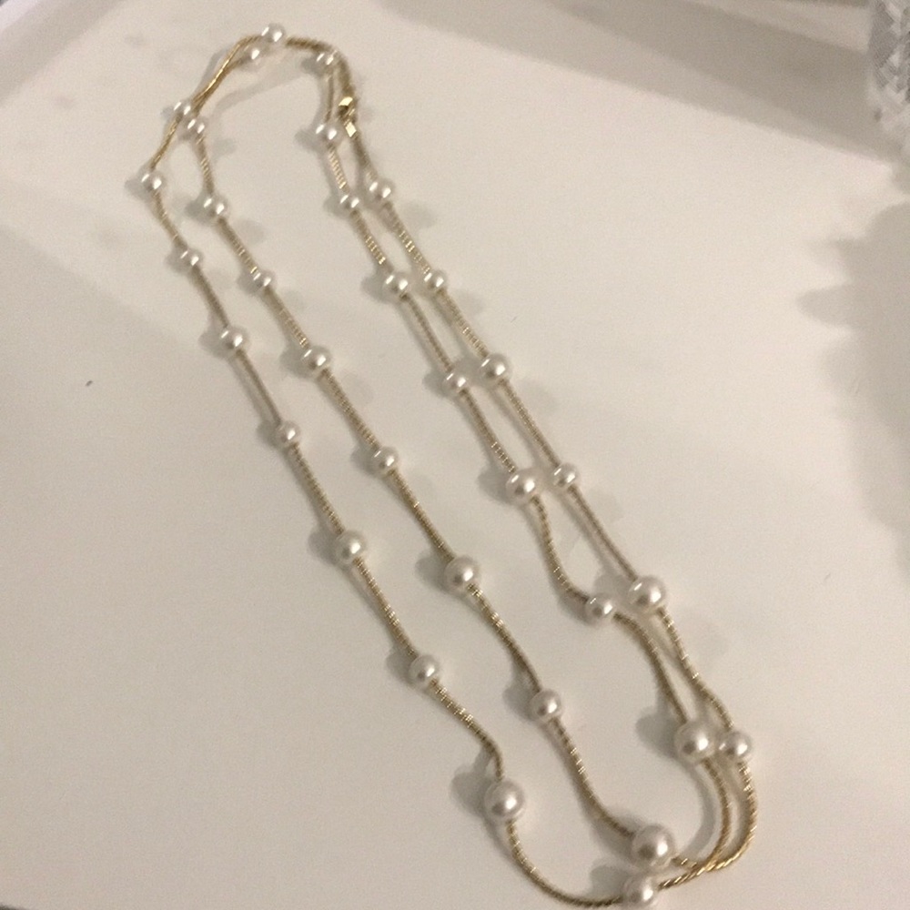 Long faux pearl necklace