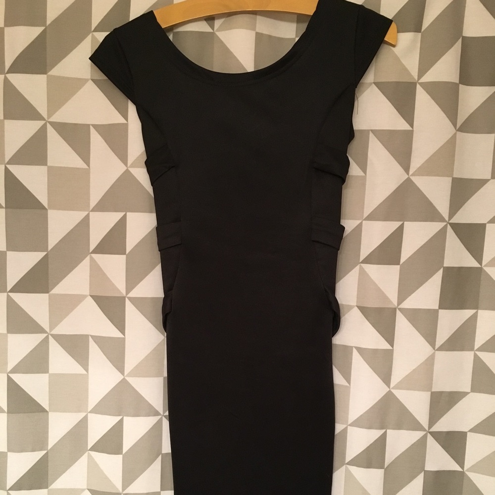 Little black dress - mid thigh, open back