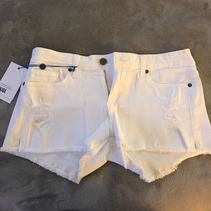White distressed Paige shorts