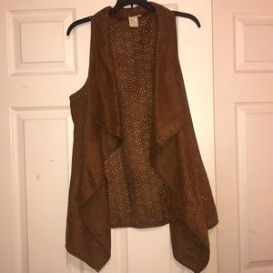brown vest with flower design