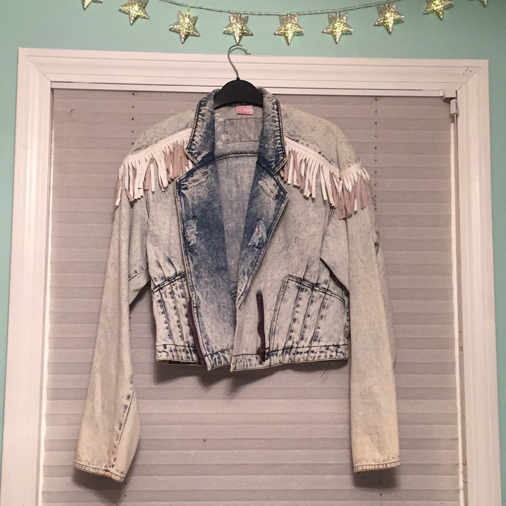 Vintage denim jacket with fringe. Retro 80s.