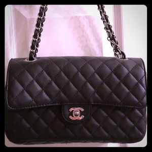 Black quilted handbag