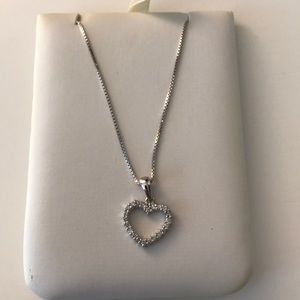 Diamond Heart charm on silver necklace. Never worn
