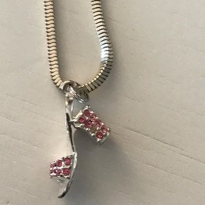 Pink rhinestone shoe charm on silver necklace