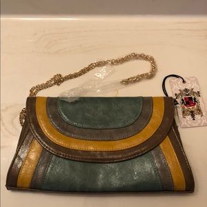 CUTE CLUTCH,  NEVER WORN, VEGAN LEATHER.